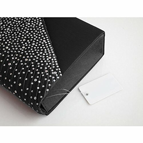 Black clutch purse with diamond studs and a white tag