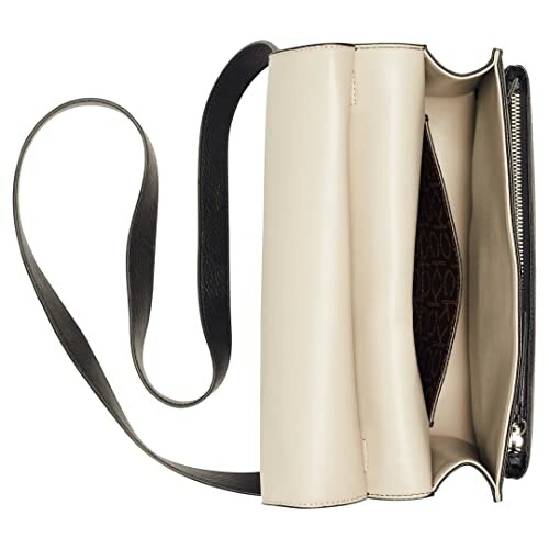 Cream leather shoulder bag with black strap and open top view